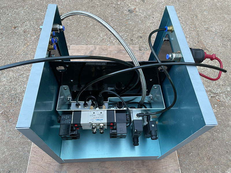 Solenoid bracket mounted to box