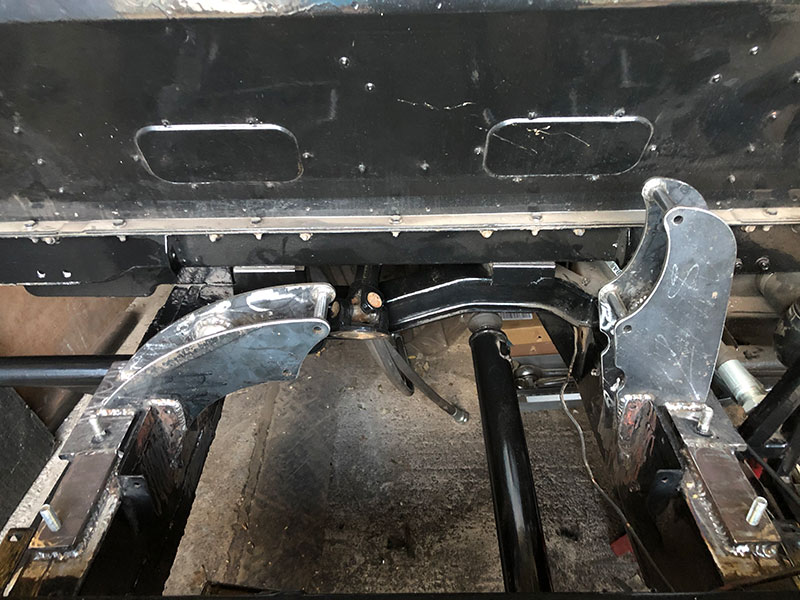 Case brackets welded to chassis